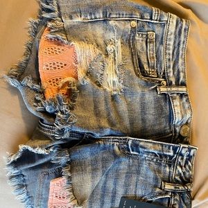 Ripped jean shorts